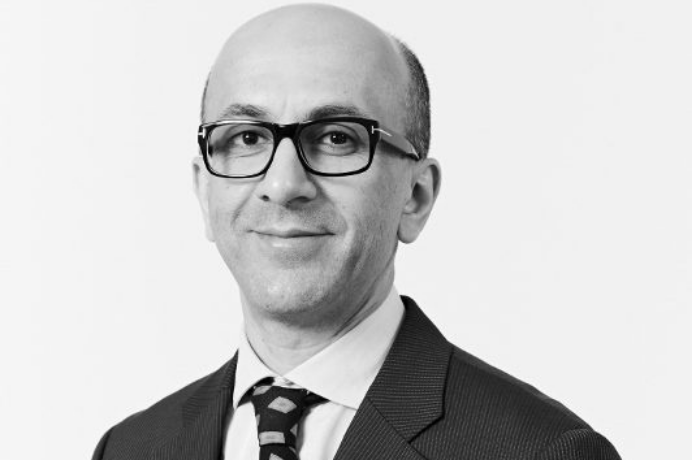 Black and white portrait picture of Aneel Mussarat CEO and founder of MCR Property Group